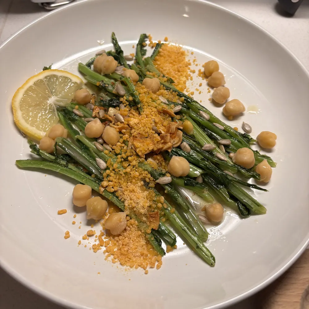 A plated green bean and chickpea dish