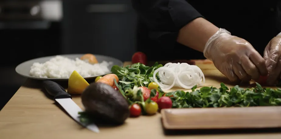 A prep board of fresh vegetables before service