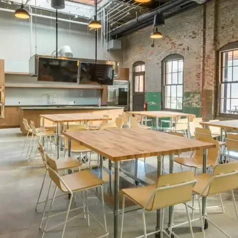 The Show + Tell kitchen interior with long communal tables